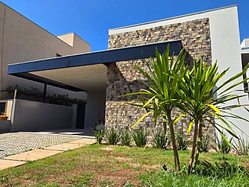 Casa t�rrea � venda em condom�nio